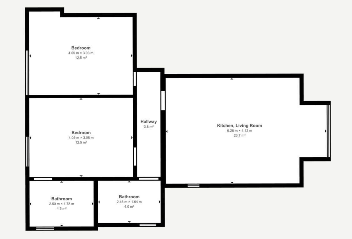 A floor plan with two bedrooms, two bathrooms, a hallway, and a kitchen/living room.