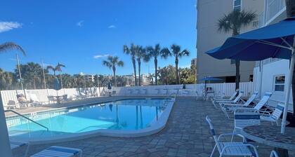 The beach is your backyard! Family size condo on Indian Shores! Sleeps 10!