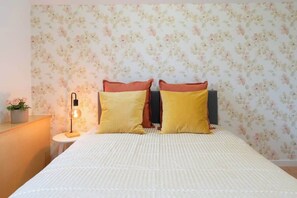 4 bedrooms, iron/ironing board, travel cot, WiFi