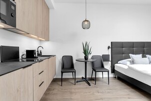 Standard Studio | Private kitchen | Coffee/tea maker, electric kettle, dining tables