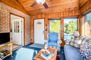 TV, fireplace, DVD player, books - Dog-friendly, lake view home with three season room, fireplace, video projector (Arcadia)