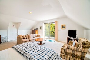 TV, fireplace, DVD player, books - Dog-friendly, lake view home with three season room, fireplace, video projector (Arcadia)