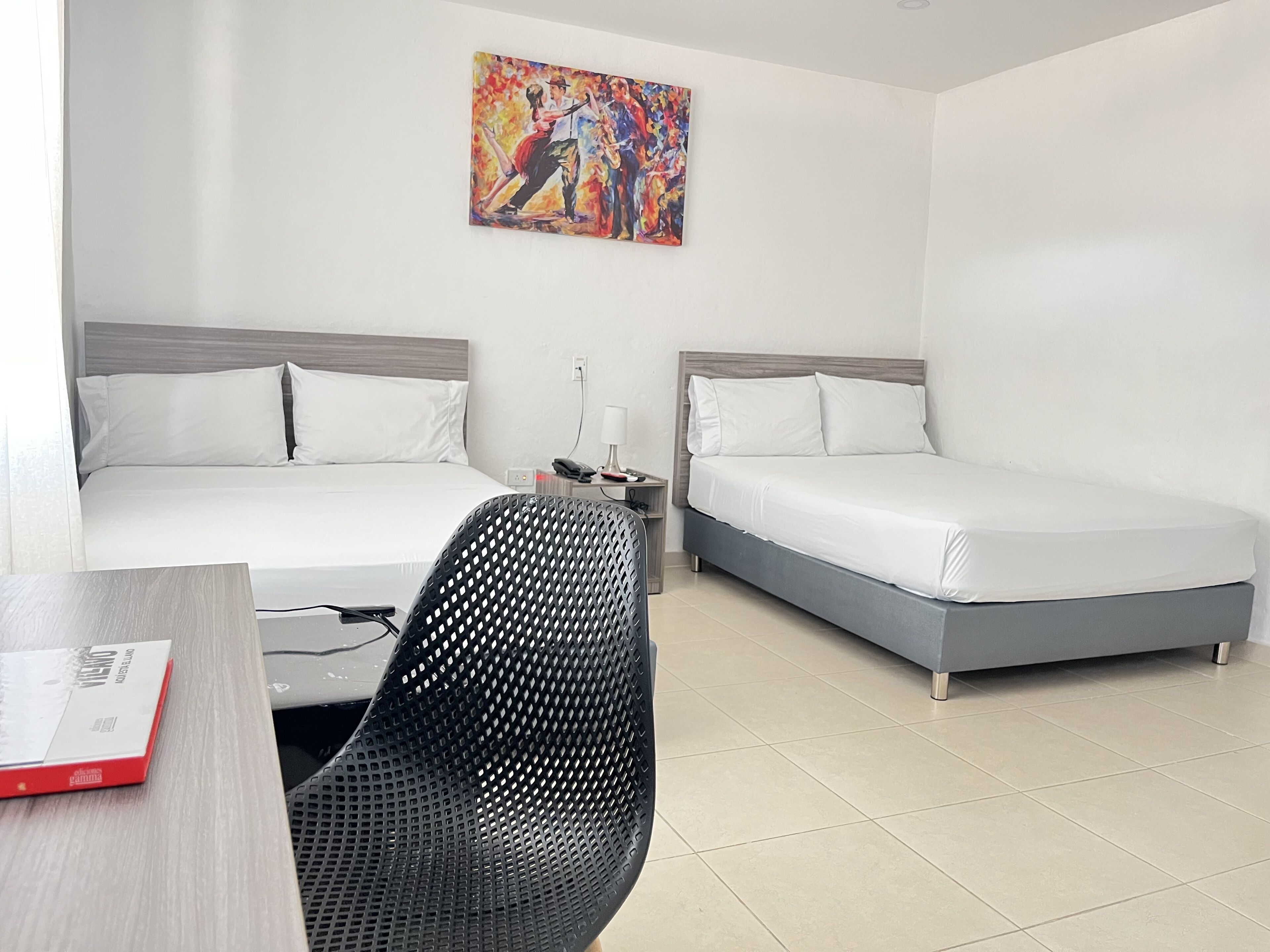 Family Room | Minibar, desk, free WiFi, bed sheets