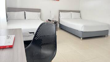 Family Room | Minibar, desk, free WiFi, bed sheets