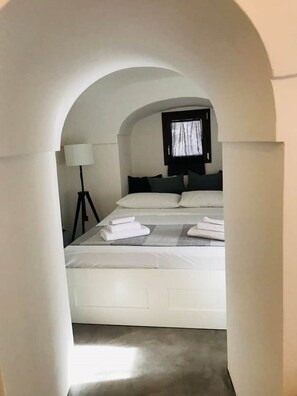 1 bedroom, bed sheets - The cave of benikulà ancient Pantelleria Dammuso Andrea 6 (Scauri)