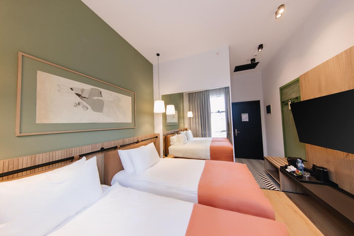 Basic Double Room | 1 bedroom, in-room safe, laptop workspace, blackout drapes