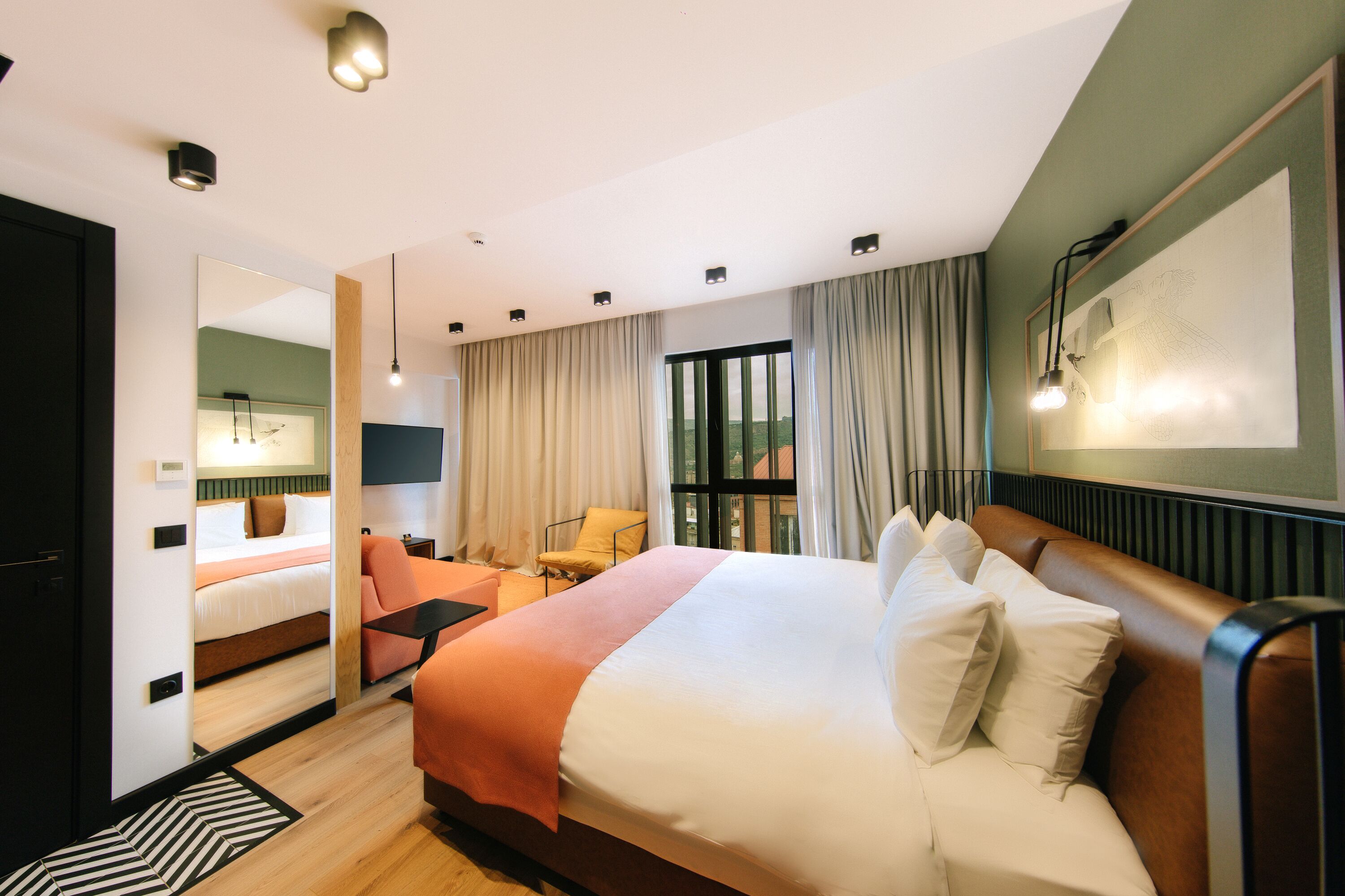 In-room safe, laptop workspace, blackout drapes, soundproofing