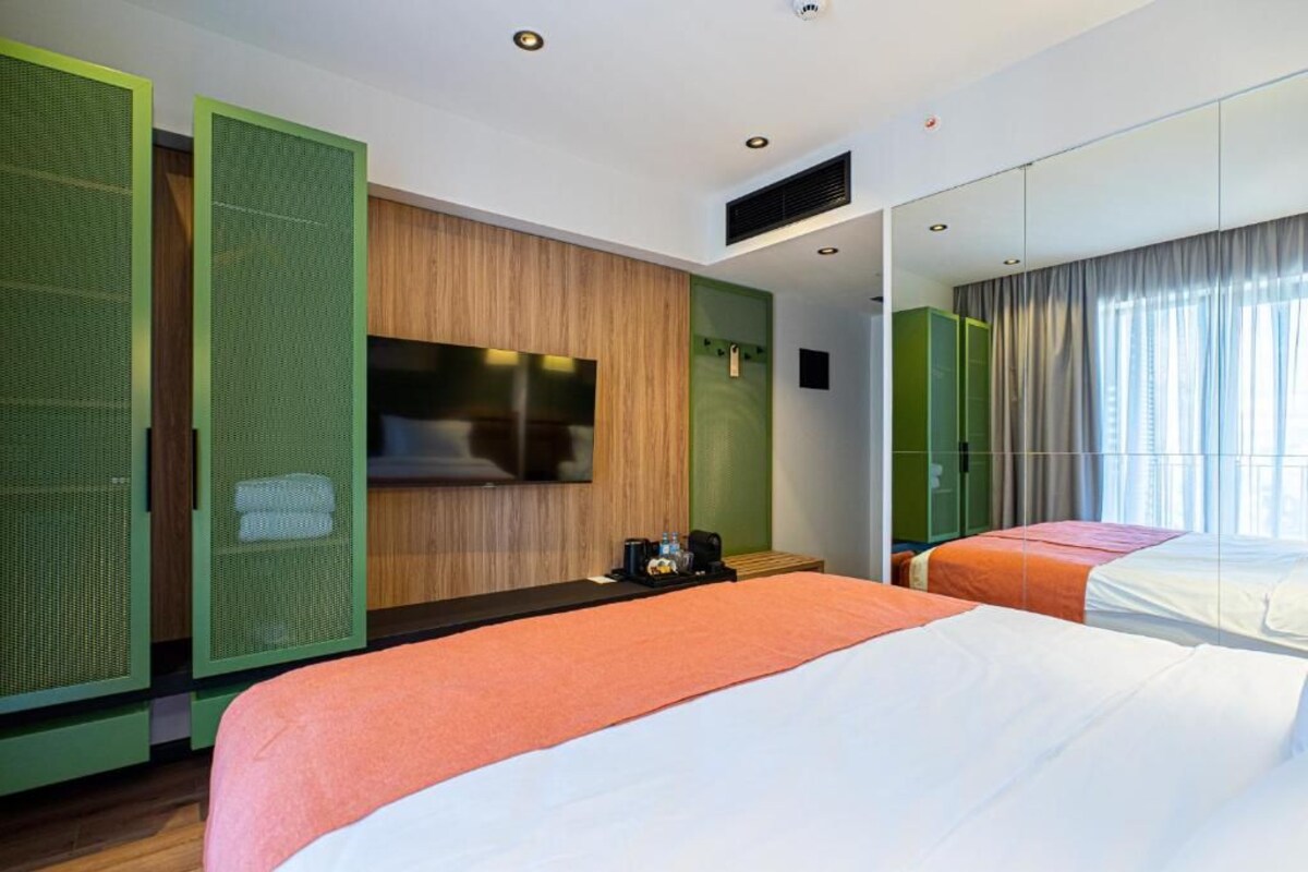 In-room safe, laptop workspace, blackout drapes, soundproofing