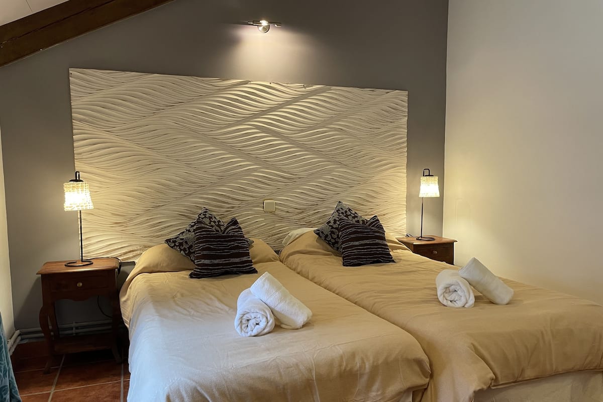 2 bedrooms, premium bedding, down duvets, individually decorated