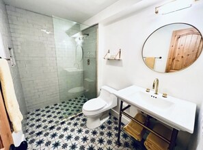 Shower, towels, toilet paper
