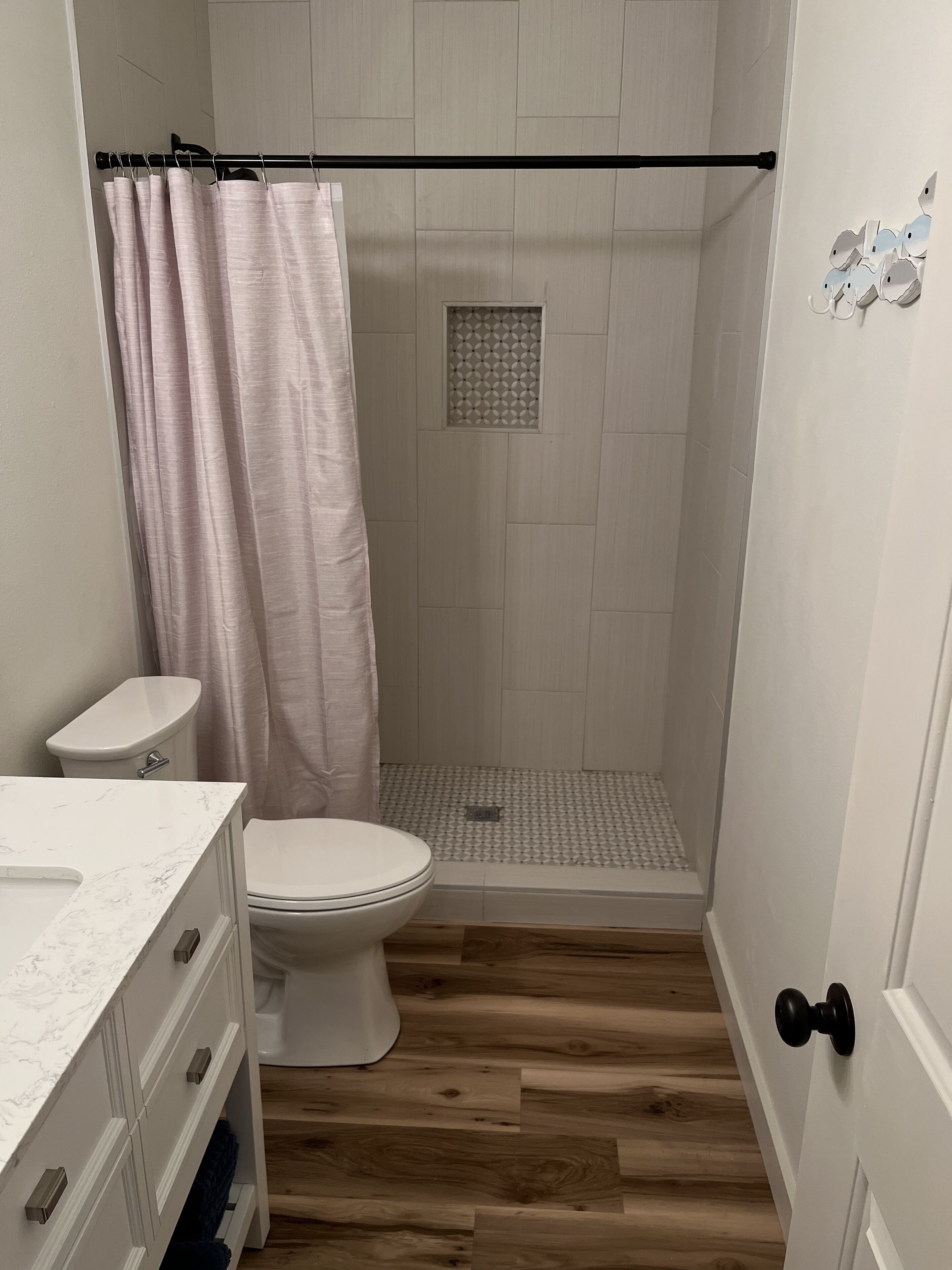 Shower, towels, toilet paper