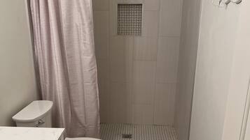 Shower, towels, toilet paper