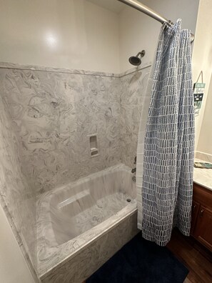 Combined shower/tub
