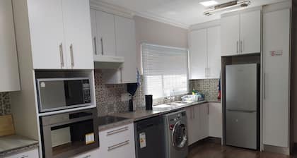 BLESSING furnished apartment, fully equipped kitchen, bathroom, lounge, bedroom.