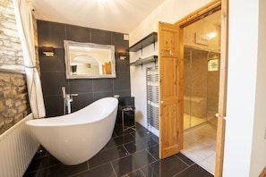 Bathtub, hair dryer, towels