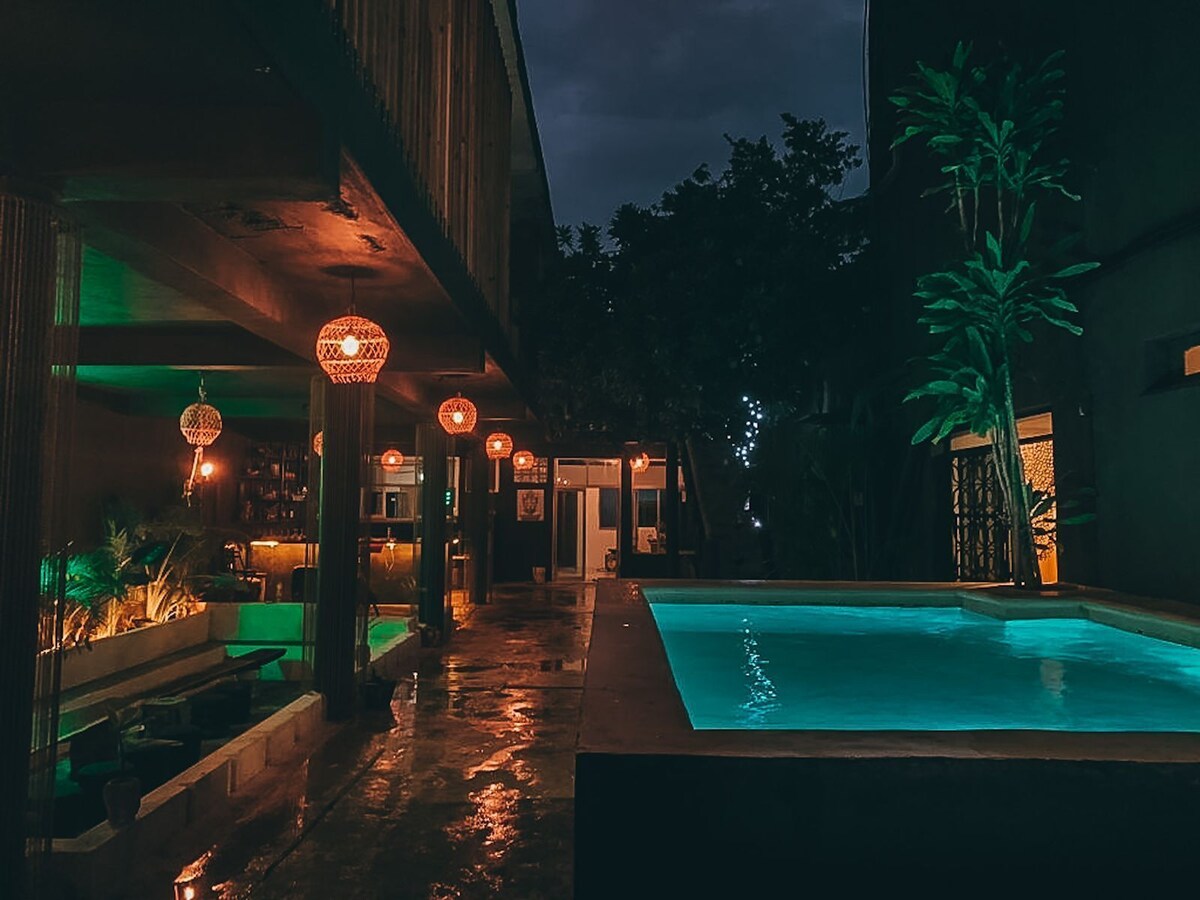 pool area at night Shambalam Hostel - best Tulum hostels