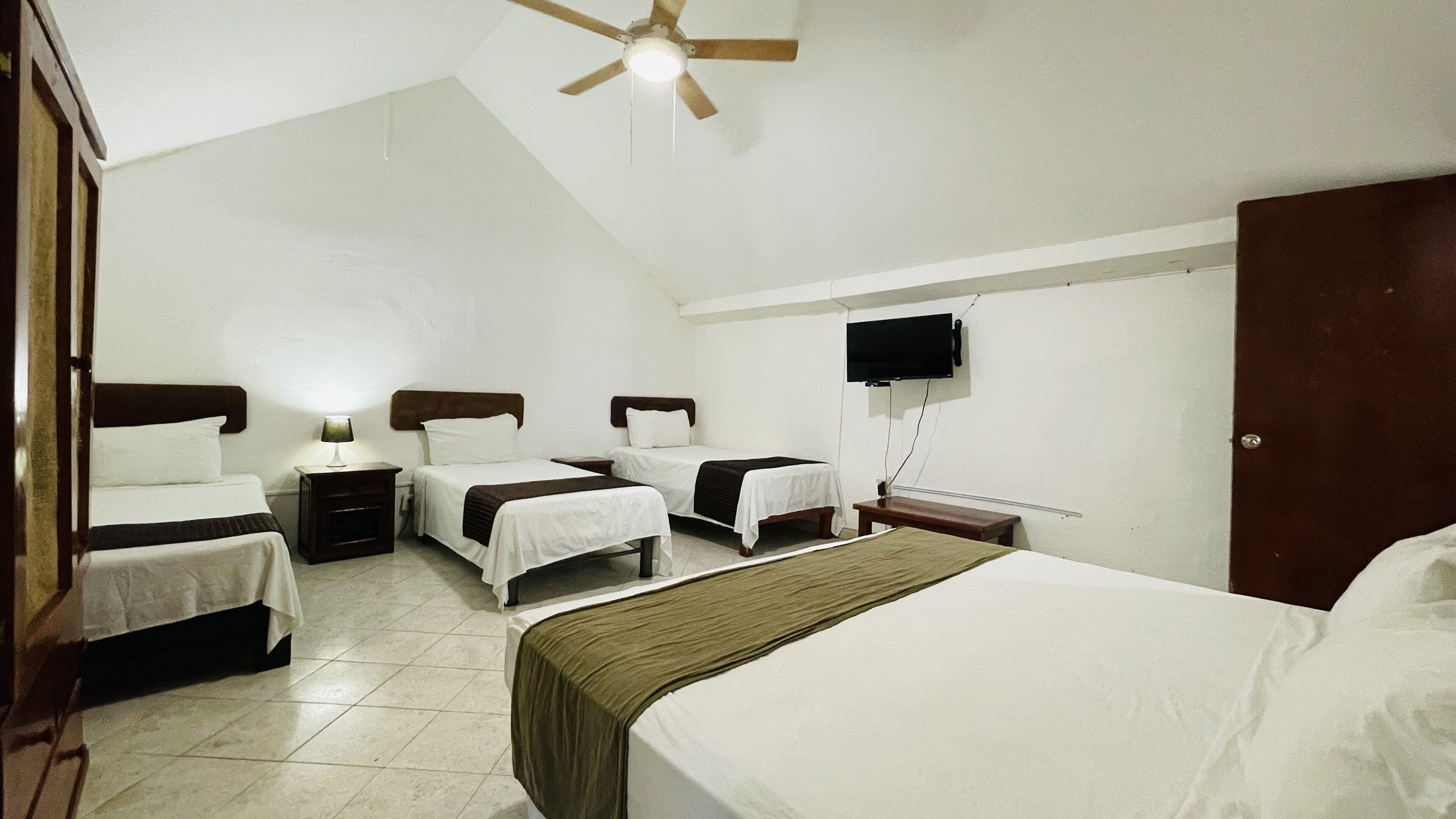 Basic Quadruple Room, Multiple Beds | Free WiFi, bed sheets