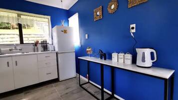 Fridge, microwave, electric kettle, toaster