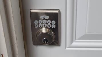 A door with a numeric keypad lock.