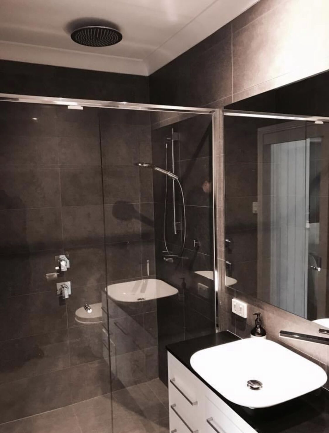 Bathtub, hair dryer, towels, soap