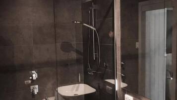 Bathtub, hair dryer, towels, soap