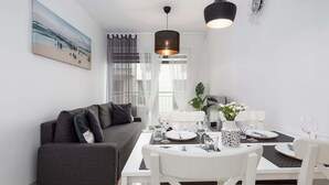 TV, offices - Modern Apartment | Separate Bedroom and Balcony (Kołobrzeg)