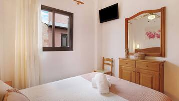 2 dormitorios, tabla de planchar con plancha, wifi gratis y ropa de cama