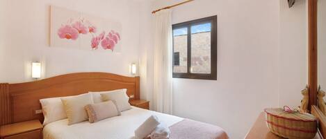 2 dormitorios, tabla de planchar con plancha, wifi gratis y ropa de cama