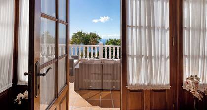 Maison de vacances "Casa 1700 Los Quemados" avec vue sur la mer, Wi-Fi, jardin et terrasse.