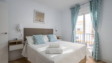 2 dormitorios, tabla de planchar con plancha, wifi gratis y ropa de cama