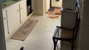 Fridge, microwave, toaster oven, cookware/dishes/utensils