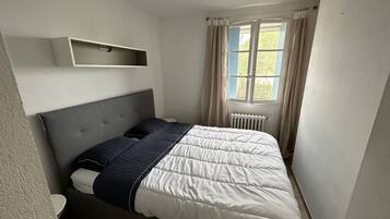 2 habitaciones, tabla de planchar con plancha y wifi gratis