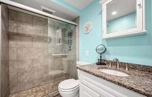 Combined shower/tub, hair dryer, towels, toilet paper