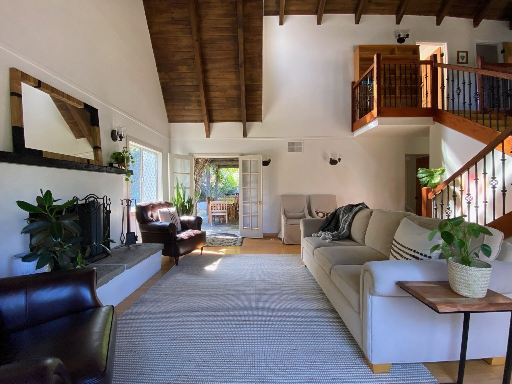 Living room with view to back dining patio