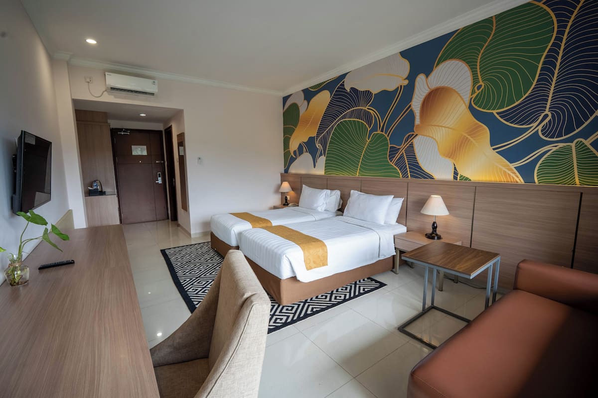 Habitación Deluxe, vista al jardín | Escritorio, espacio para trabajar con laptop y insonorización