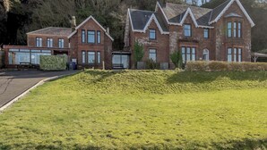A large brick house with multiple windows and a well-maintained lawn. - The Old Nunnery - UK7122 (Skelmorlie, near Largs)
