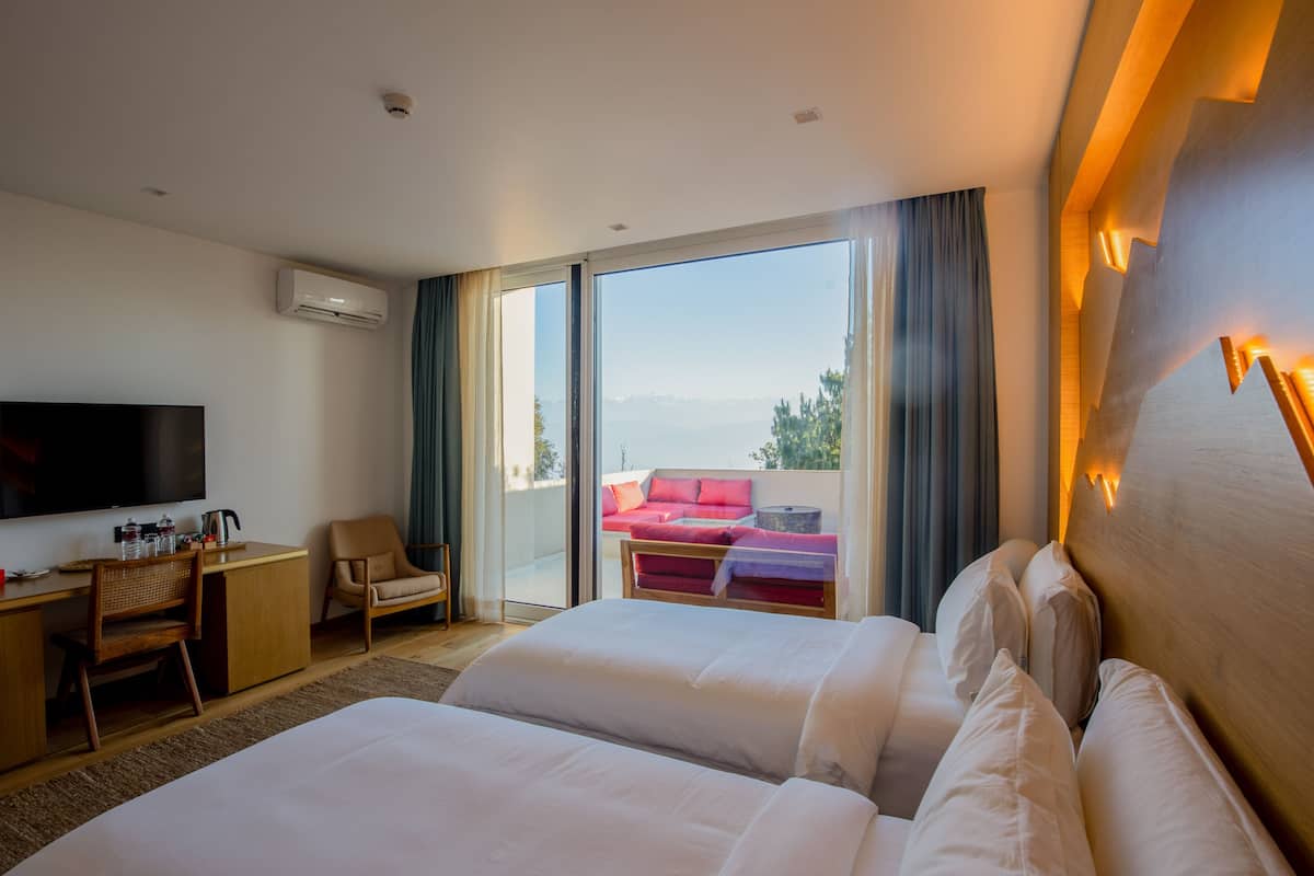 Chambre Deluxe avec lits jumeaux (Suite) | Literie de qualité, couette en duvet, articles de minibar gratuits