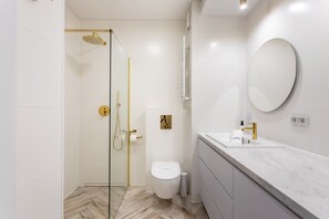 Shower, hair dryer, towels, soap