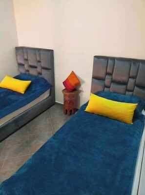 2 dormitorios, tabla de planchar con plancha, wifi gratis y ropa de cama