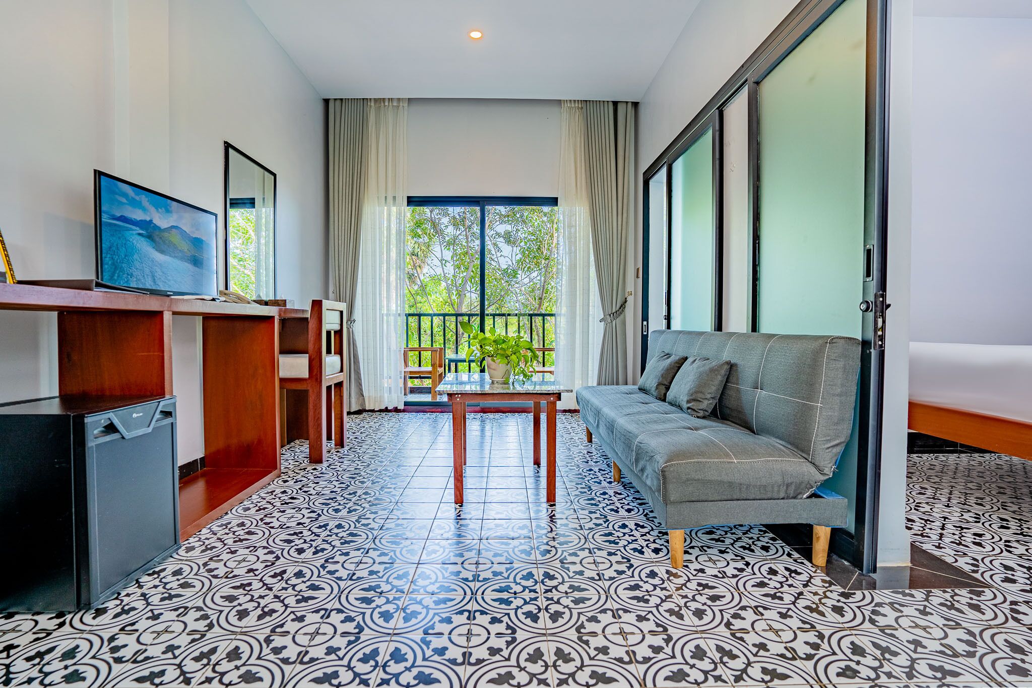 Family Room, 2 Bedrooms, Garden View | Living area | Smart TV