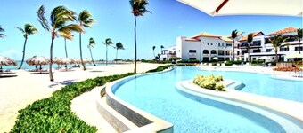COZIEST 2 BEDROOM LOFT WITH PRIVATE BEACH AT CAP CANA 