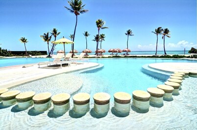 COZIEST 2 BEDROOM LOFT WITH PRIVATE BEACH AT CAP CANA 