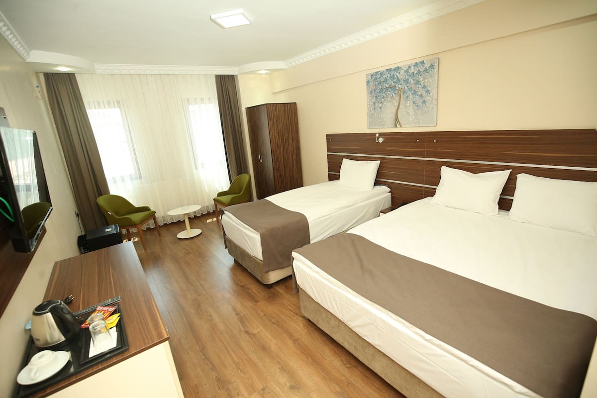 Chambre Triple Familiale, vue ville | Draps en coton égyptien, literie de qualité supérieure