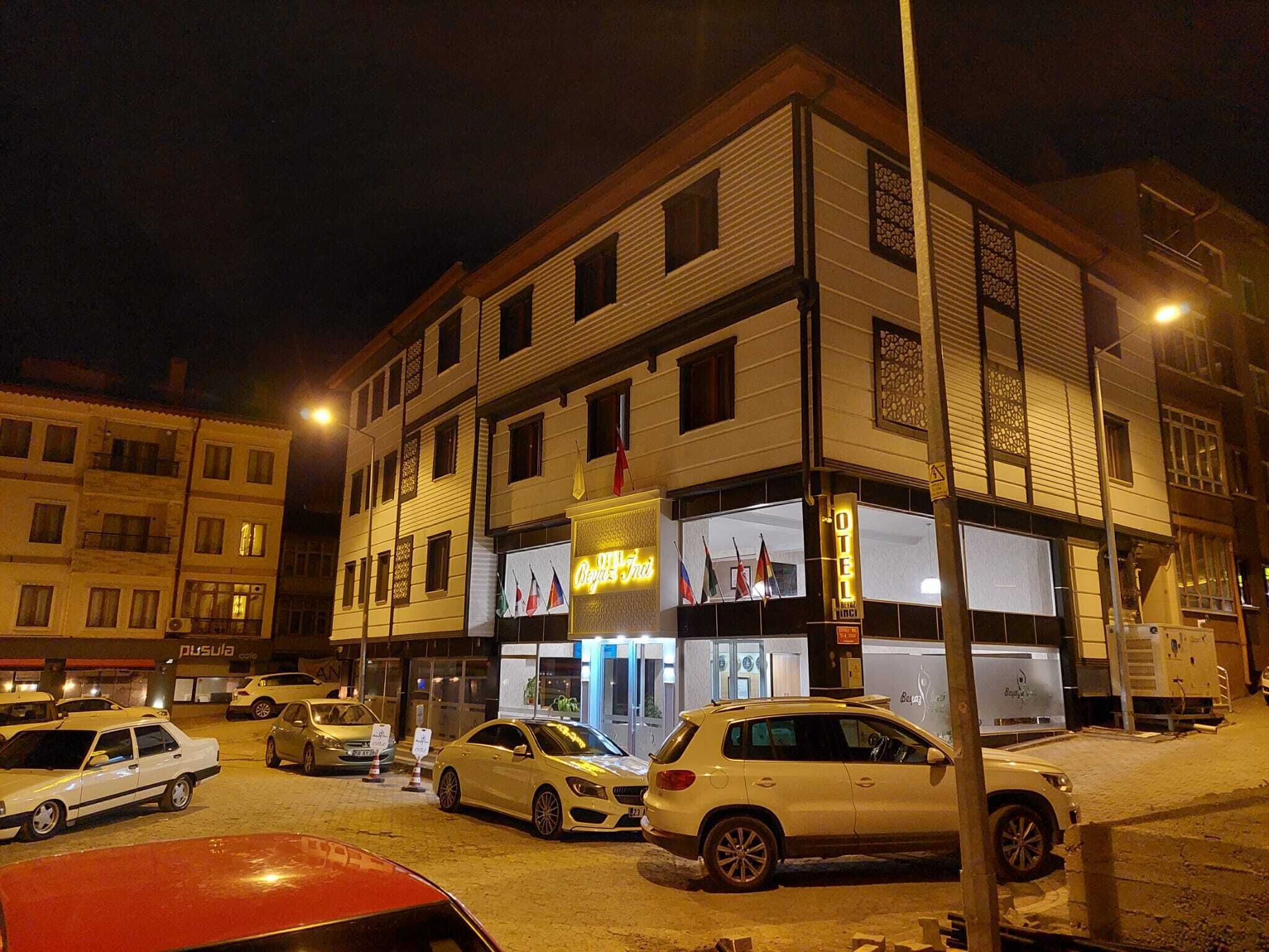 A hotel with a ground floor restaurant and upper residential or office spaces.