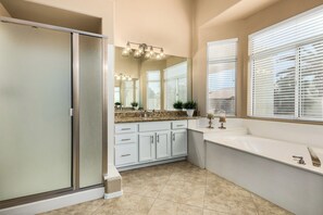 Combined shower/tub, hair dryer, towels, soap