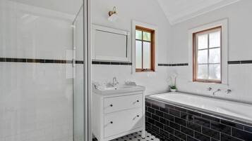 Bathtub, hair dryer, towels