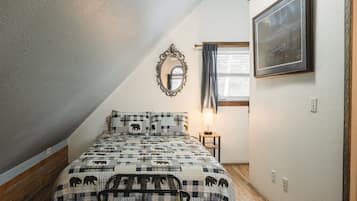 1 bedroom, desk, iron/ironing board, travel cot