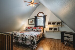 1 bedroom, desk, iron/ironing board, travel crib