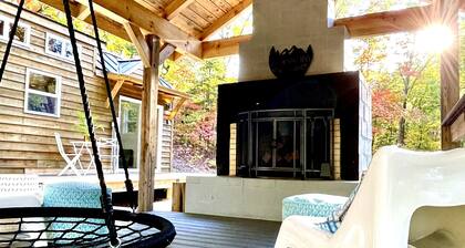 Luxury Tiny House with Treehouse Bedroom and HotTub on 34acres secluded