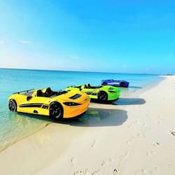 On the beach, white sand, motor boating